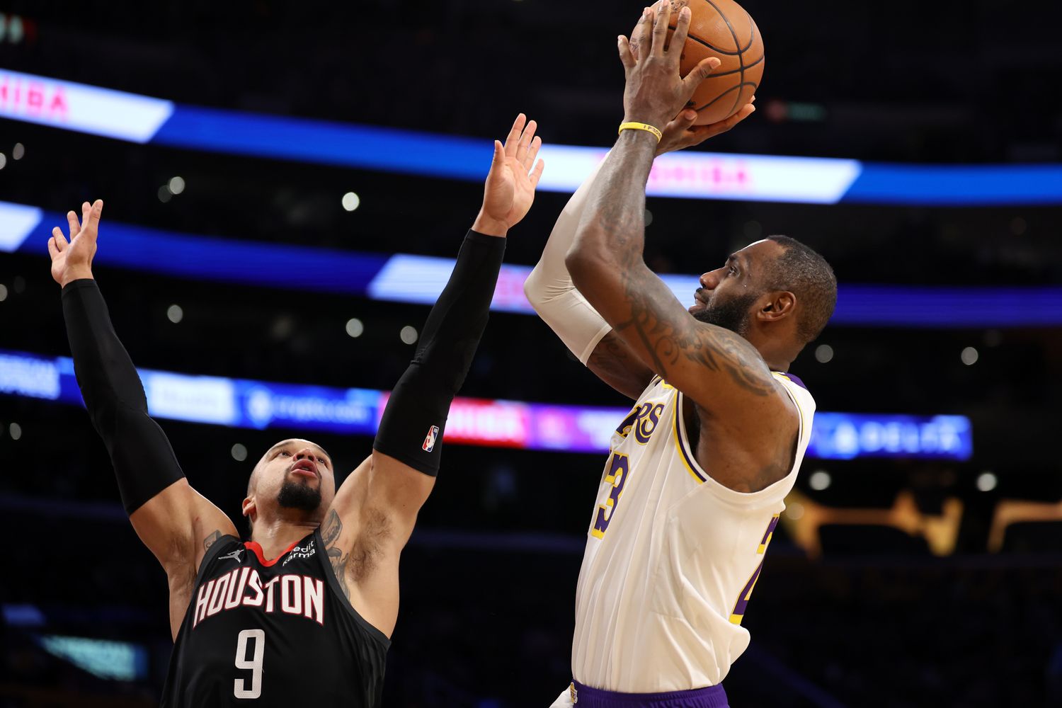 Lakers forward LeBron James (23) shoots over Houston Rockets forward Dillon Brooks (9) during the second quarter at Crypto.com Arena